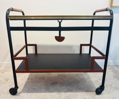 Jacques Adnet (1900-1984), rollender Servierwagen mit zwei Ablagen.