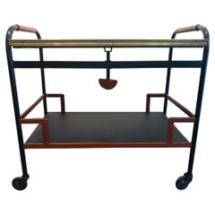 Jacques Adnet (1900-1984), rollender Servierwagen mit zwei Ablagen.