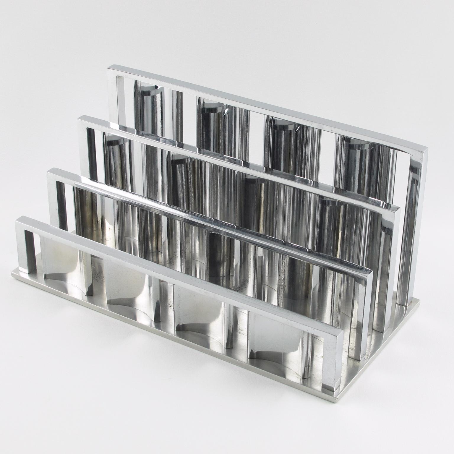 Stunning Art Deco modernist chromed metal desk accessory, letter holder designed by French Jacques Adnet (1901 - 1984). Elegant Minimalist geometric shape mail rack. 
Measurements: 11.43 in. wide (29 cm) x 5.50 in. deep (14 cm) x 5.31 in. high