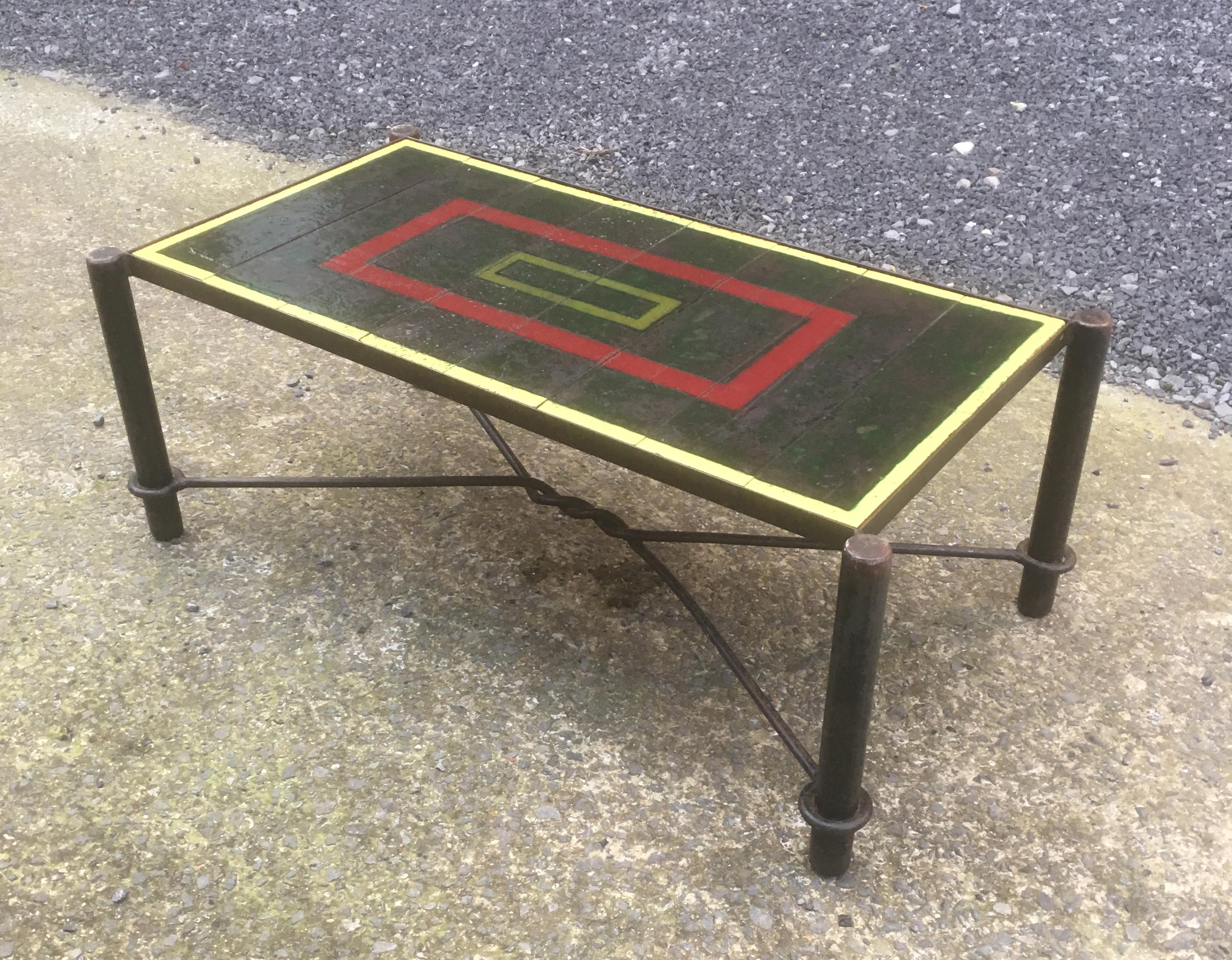 Jacques Adnet, Art Deco coffee table in lacquered metal, tray composed of tiles in enameled lava, circa 1940-1950.