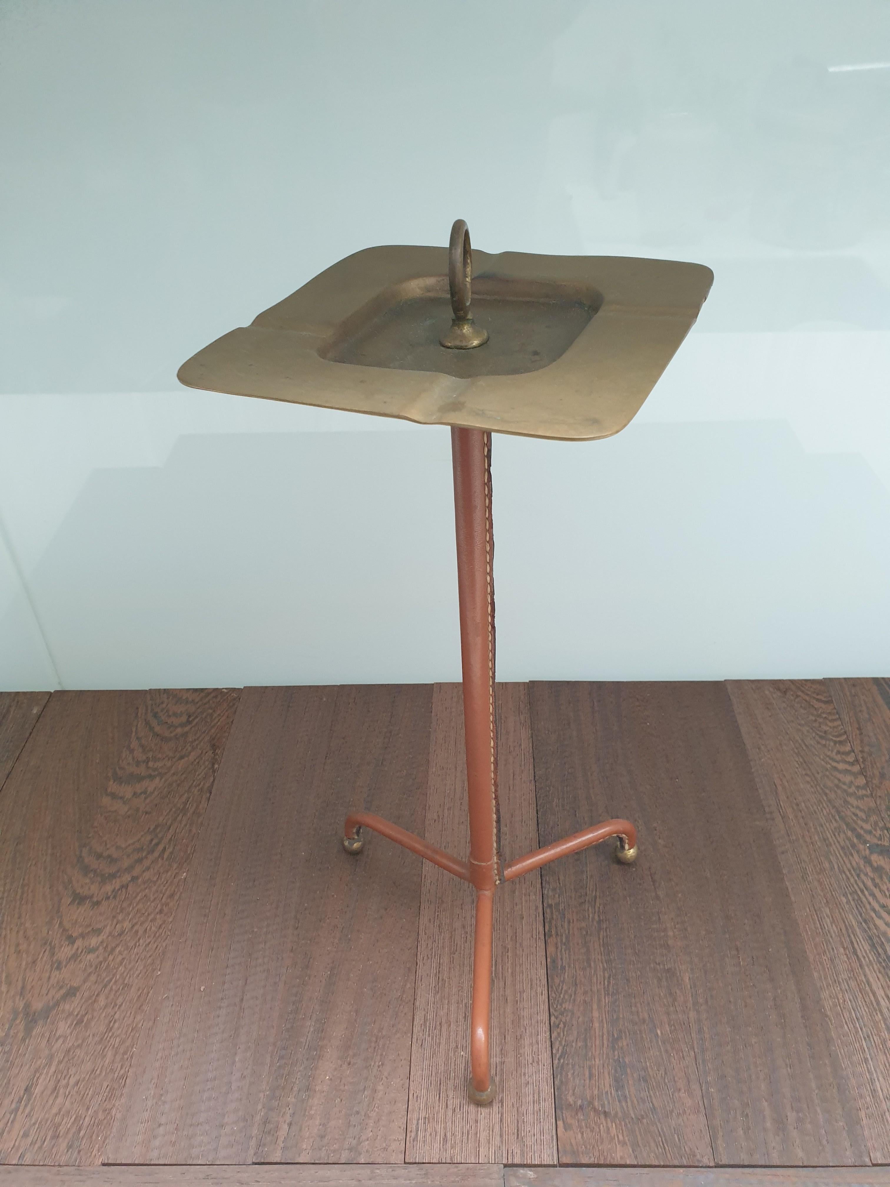 Mid-Century Modern Stitched leather ashtray on stand by Jacques adnet.