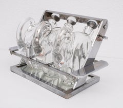 Jacques Adnet Attributed Tantulus Containing Three Baccarat Carafes
