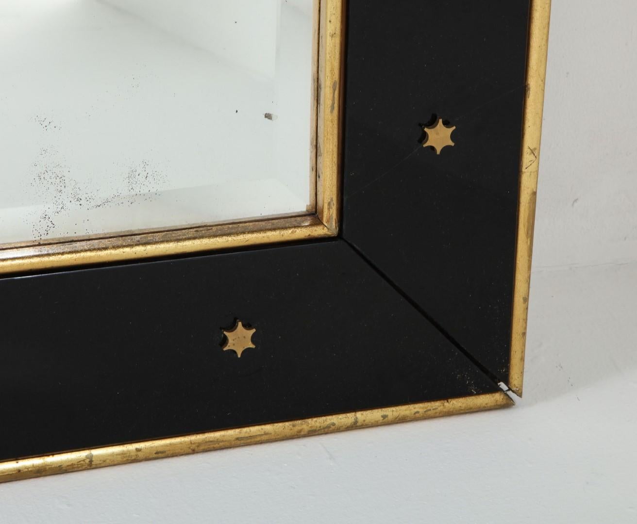 Jacques Adnet Black Glass and Gold Leaf Wall Mirror with Star Detail, circa 1940 In Good Condition In Chicago, IL