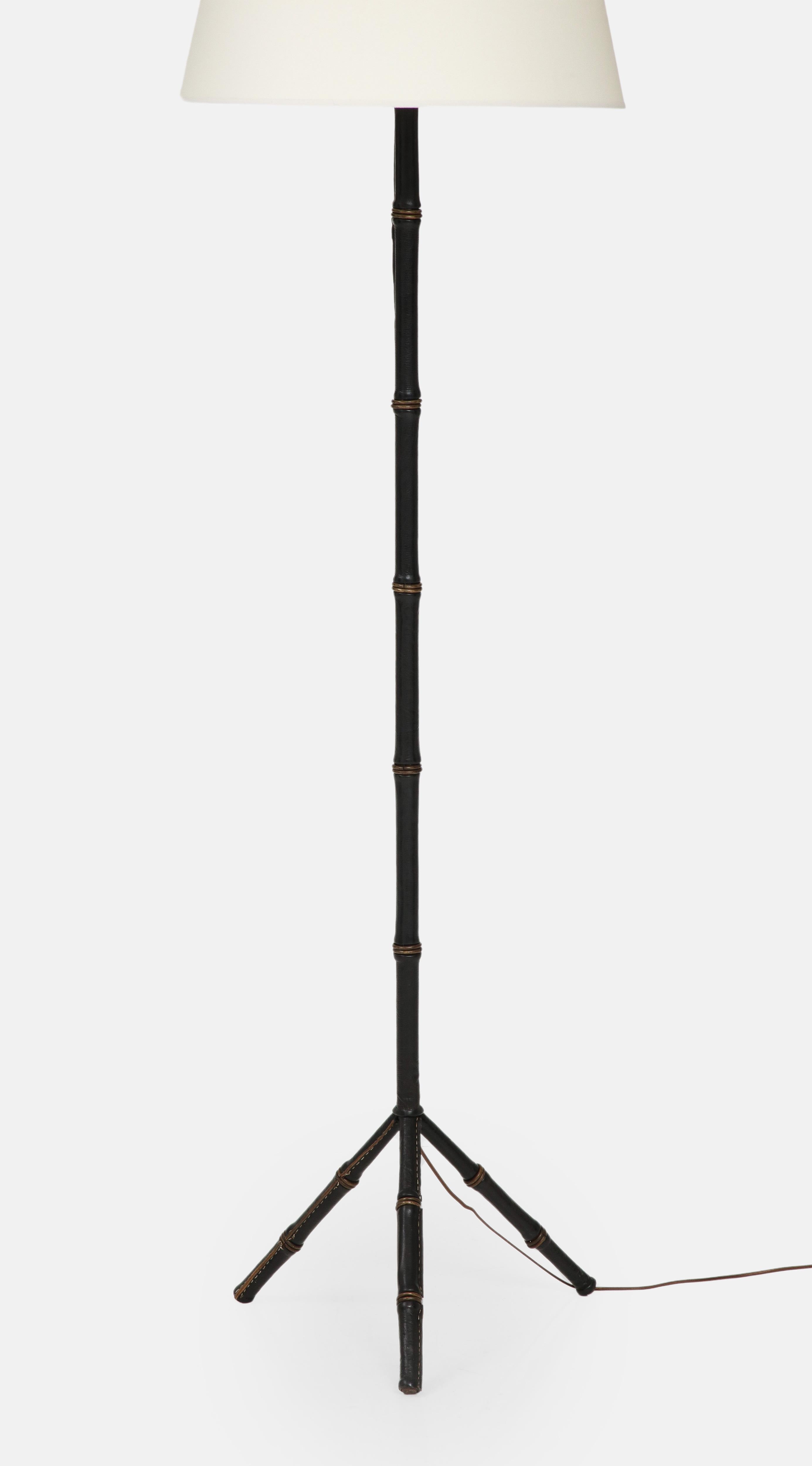 Jacques Adnet Black Leather Tripod Faux Bamboo Floor Lamp, 1950s In Good Condition For Sale In New York, NY