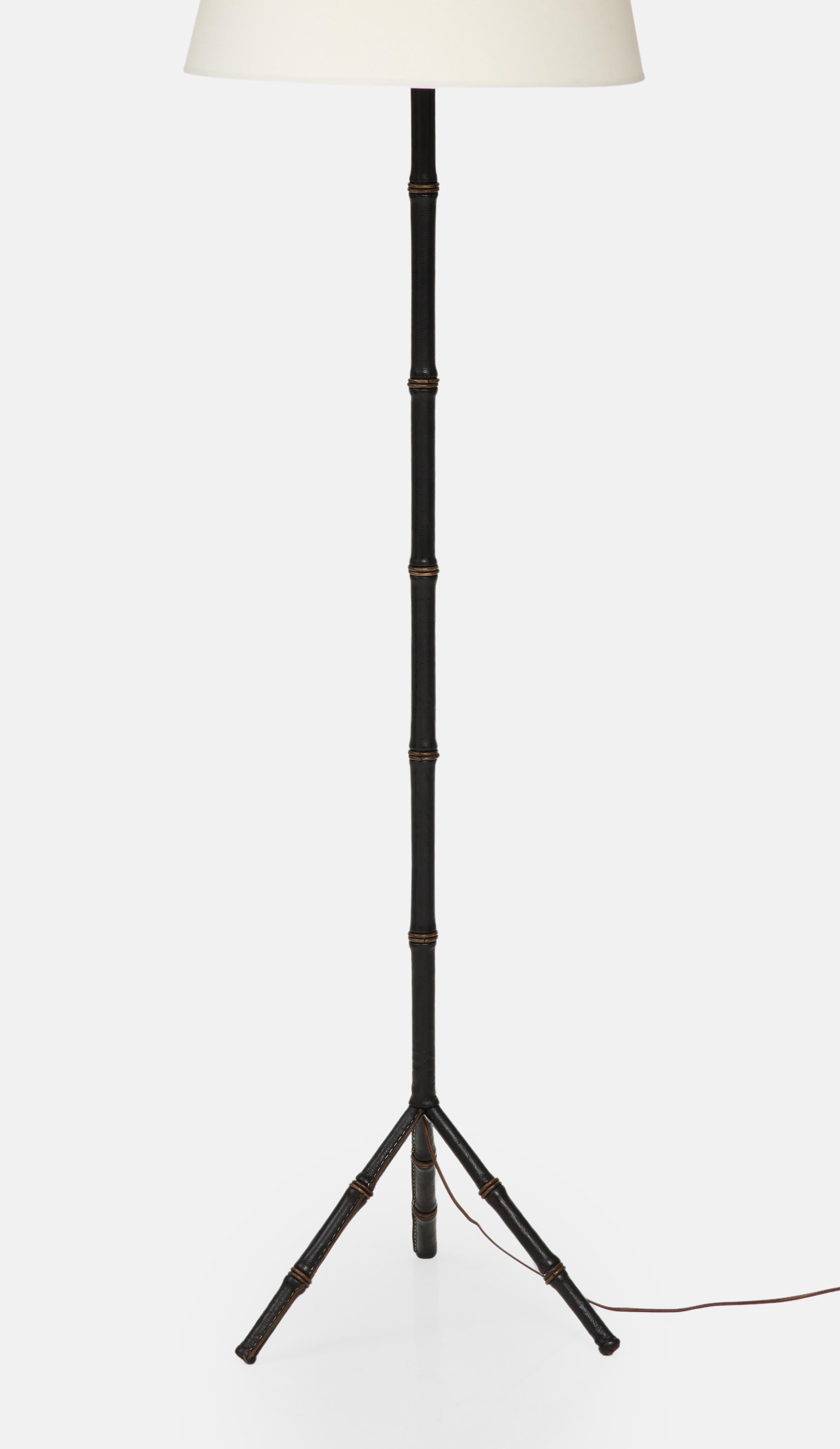 Mid-20th Century Jacques Adnet Black Leather Tripod Faux Bamboo Floor Lamp, 1950s For Sale