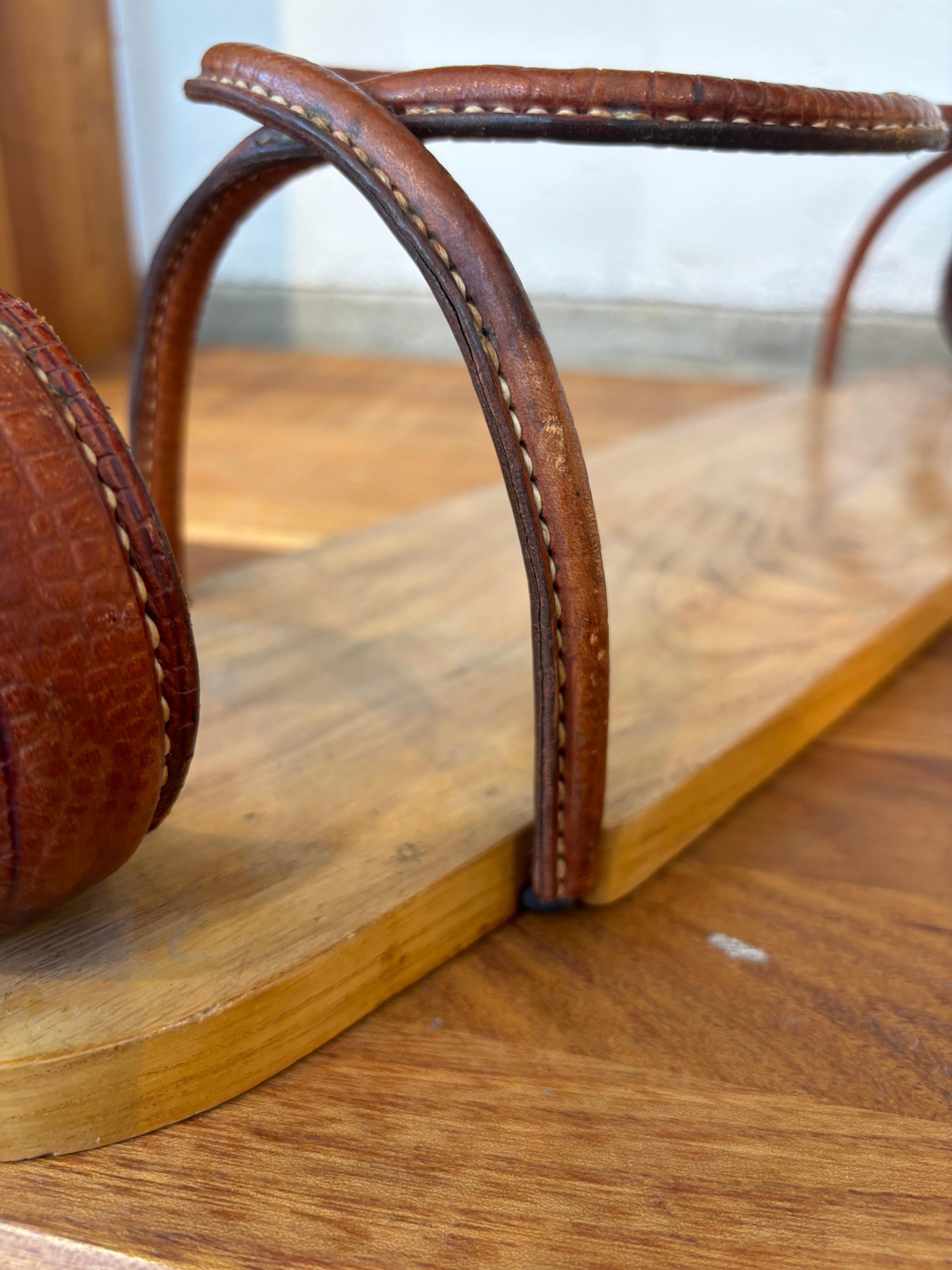 Mid-20th Century Jacques Adnet bottle holder For Sale