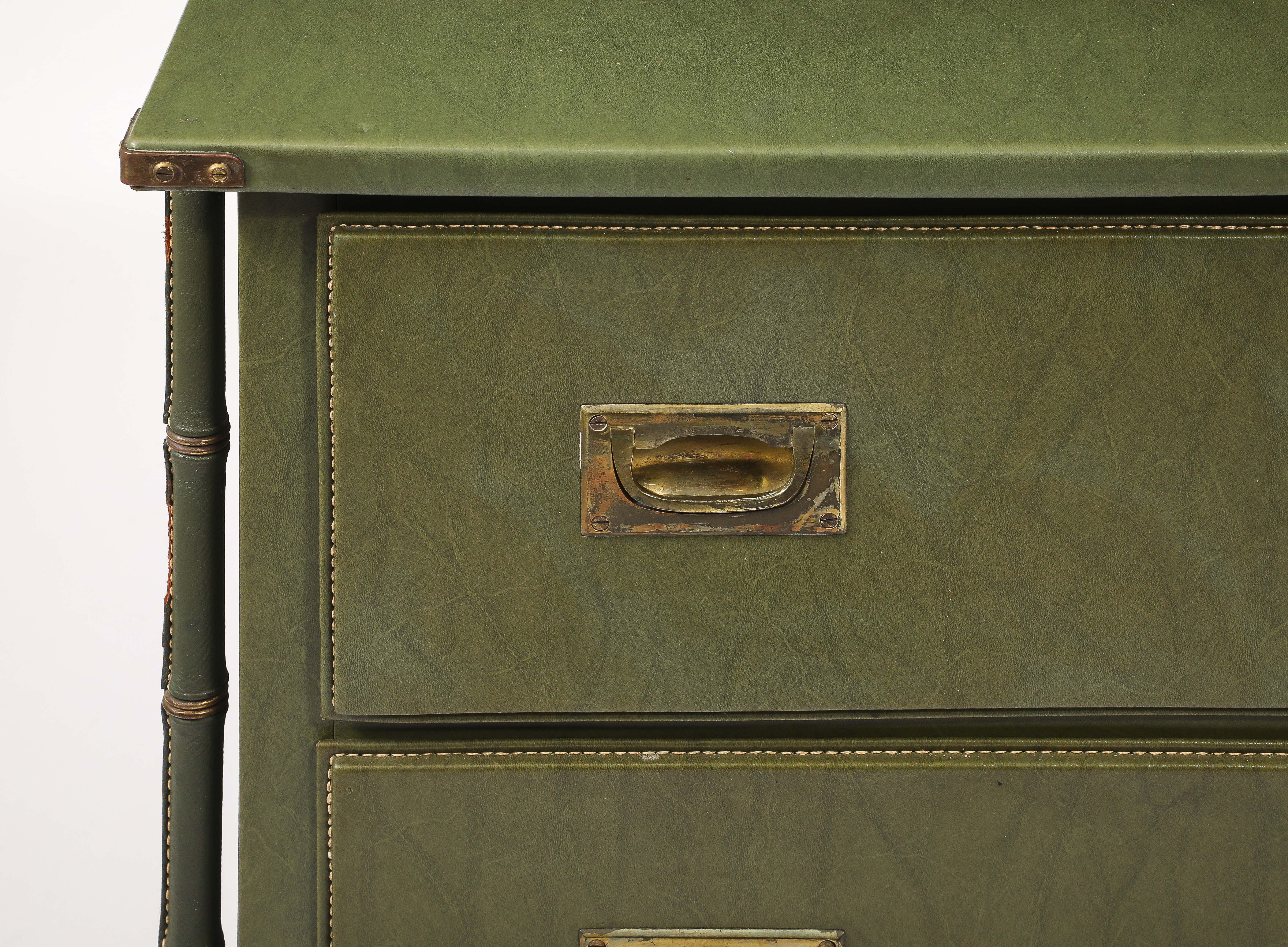 Olive green Chest of drawers with faux bamboo leather wrapped legs, recessed brass campaign handles.