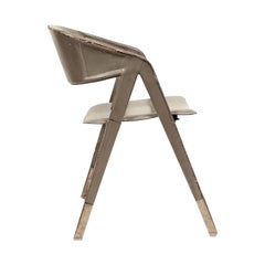 Jacques Adnet Eight Armchairs