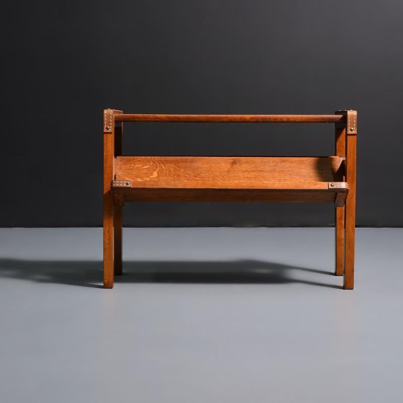 Artist/Designer; Manufacturer: Jacques Adnet (French, 1900-1984)
Marking(s); notes: no marking(s) apparent
Materials: oak, leather
Dimensions (H, W, D): 22