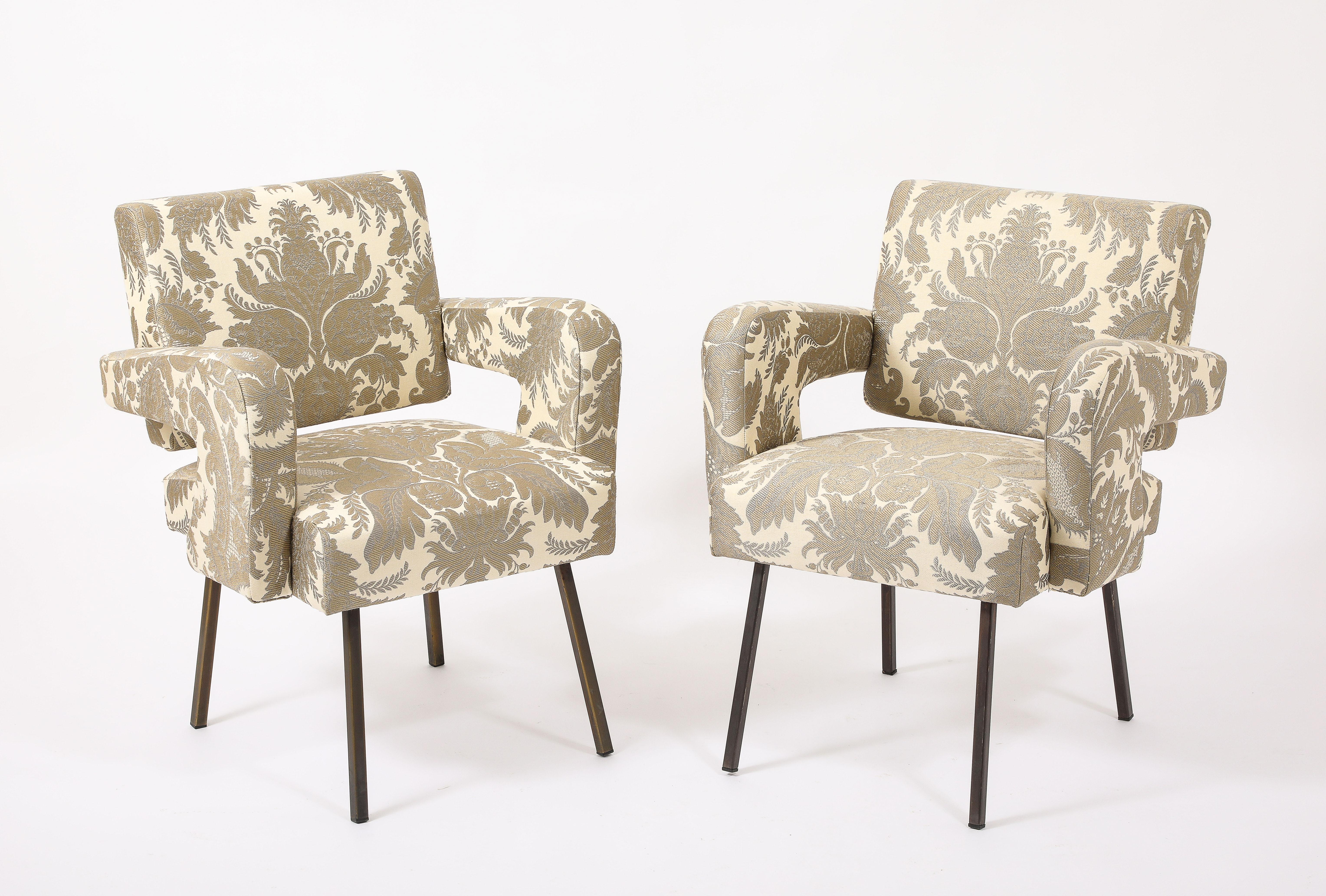 Jacques Adnet Armchairs with floating backs, freshly upholstered in made-to-order Pierre Frey embroidered fabric.

Price Per Chair
Four are available in this upholstery.