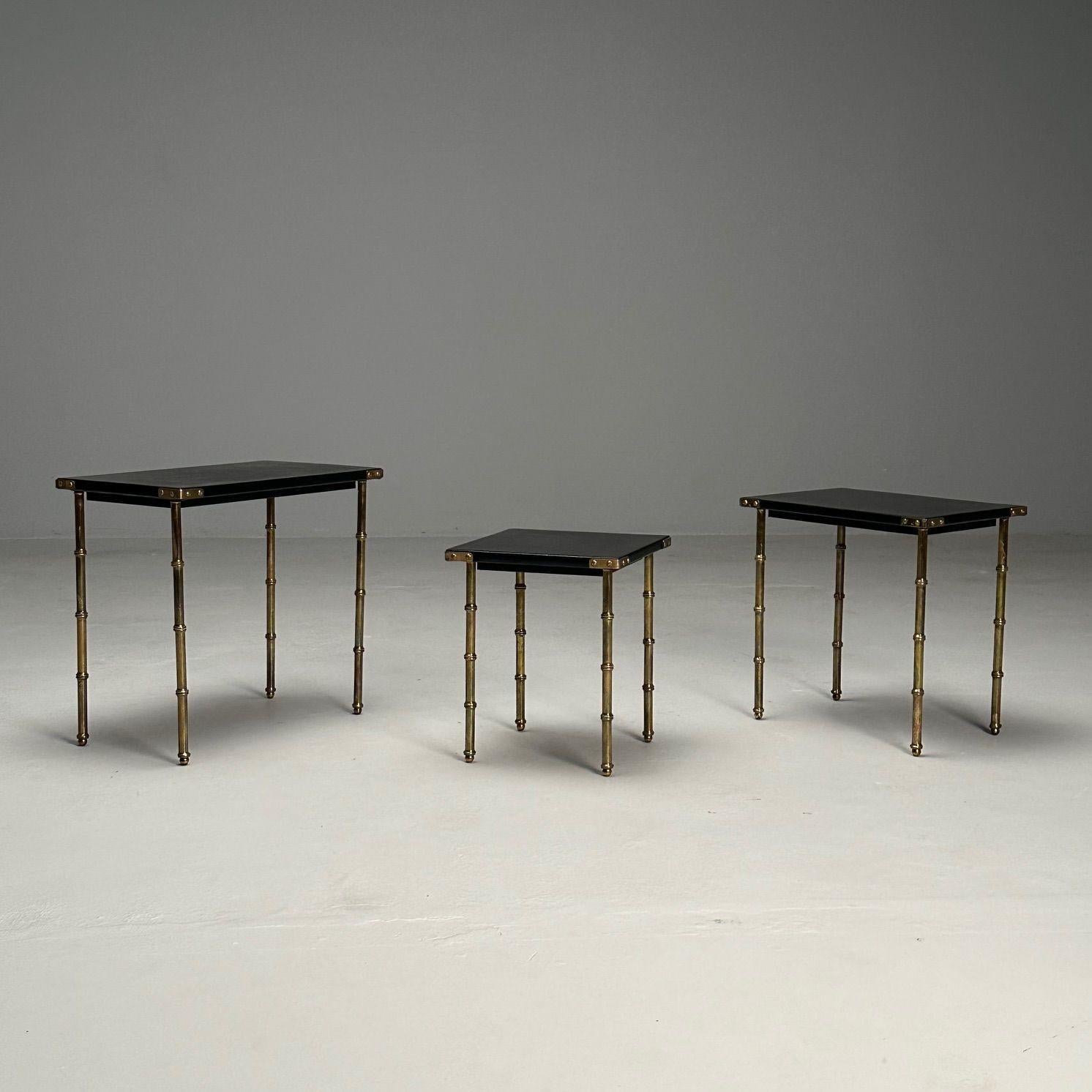 Jacques Adnet, French Mid-Century Modern, Nesting Tables, Leather, Brass, 1950s

Set of three nesting tables designed by Jacques Adnet (French, 1900-1984) and produced in France circa 1950s. Each example featuring soft black stitched leather clad