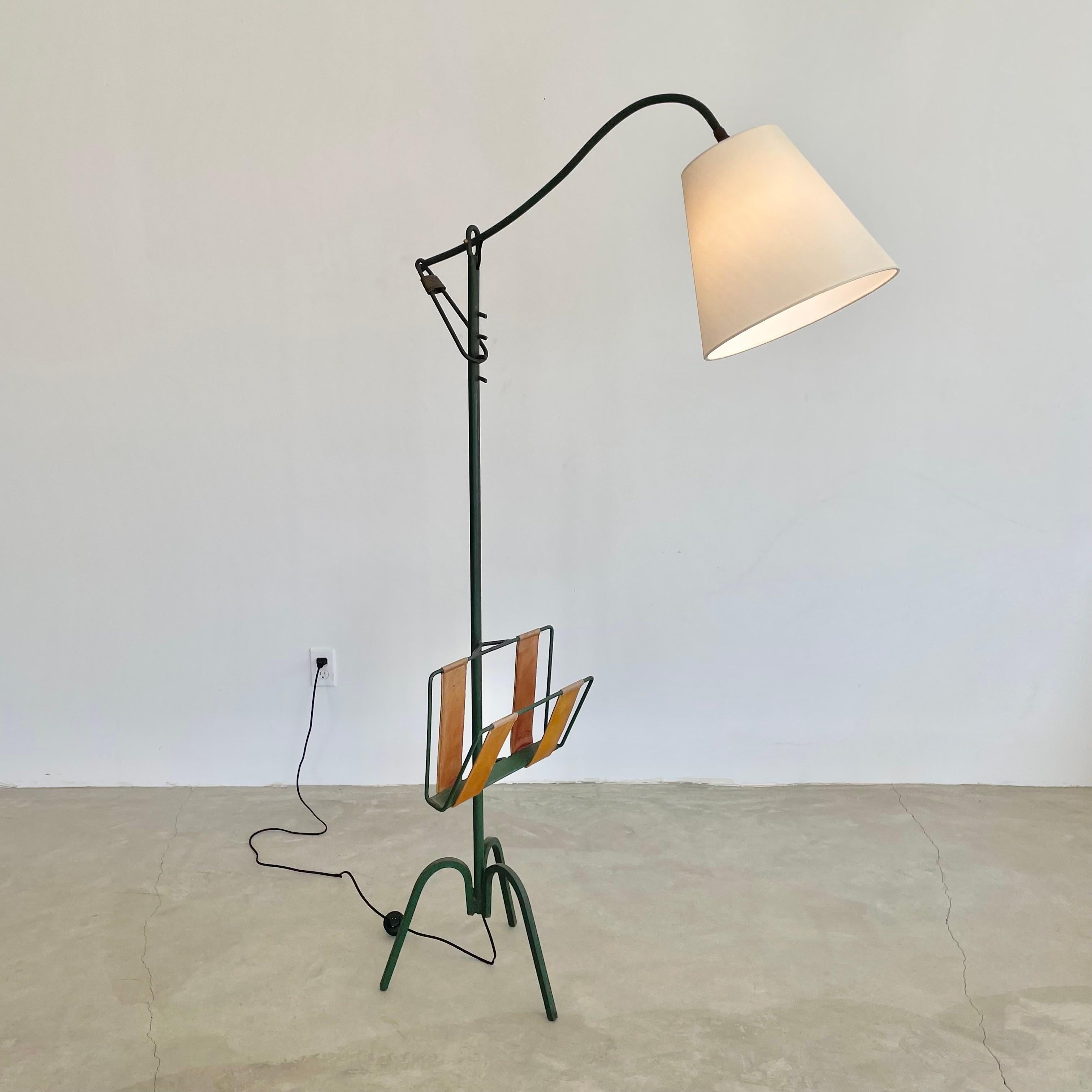 Mid-Century Modern Adjustable Iron Floor Lamp in the style of Jacques Adnet, 1950s France For Sale