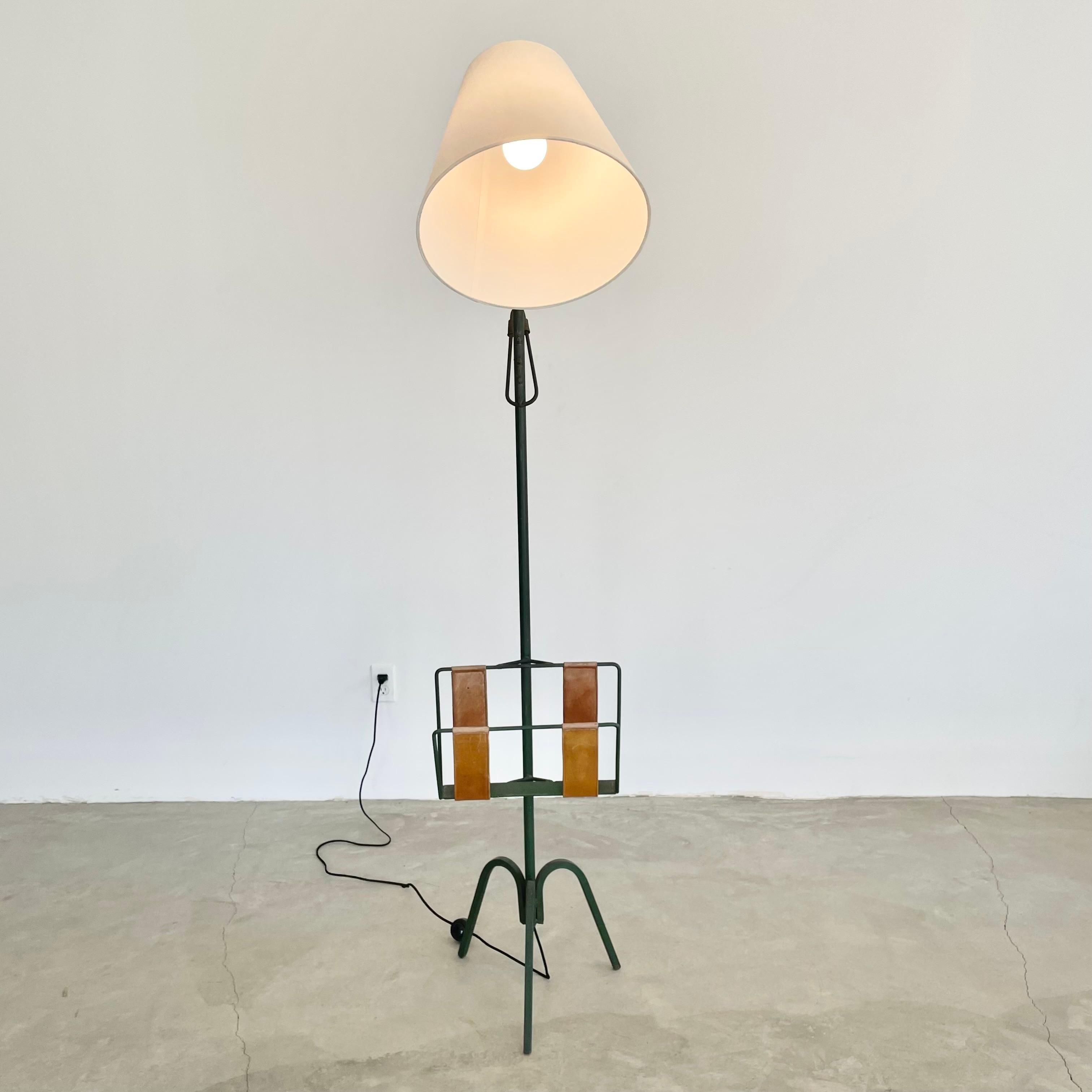 French Adjustable Iron Floor Lamp in the style of Jacques Adnet, 1950s France For Sale