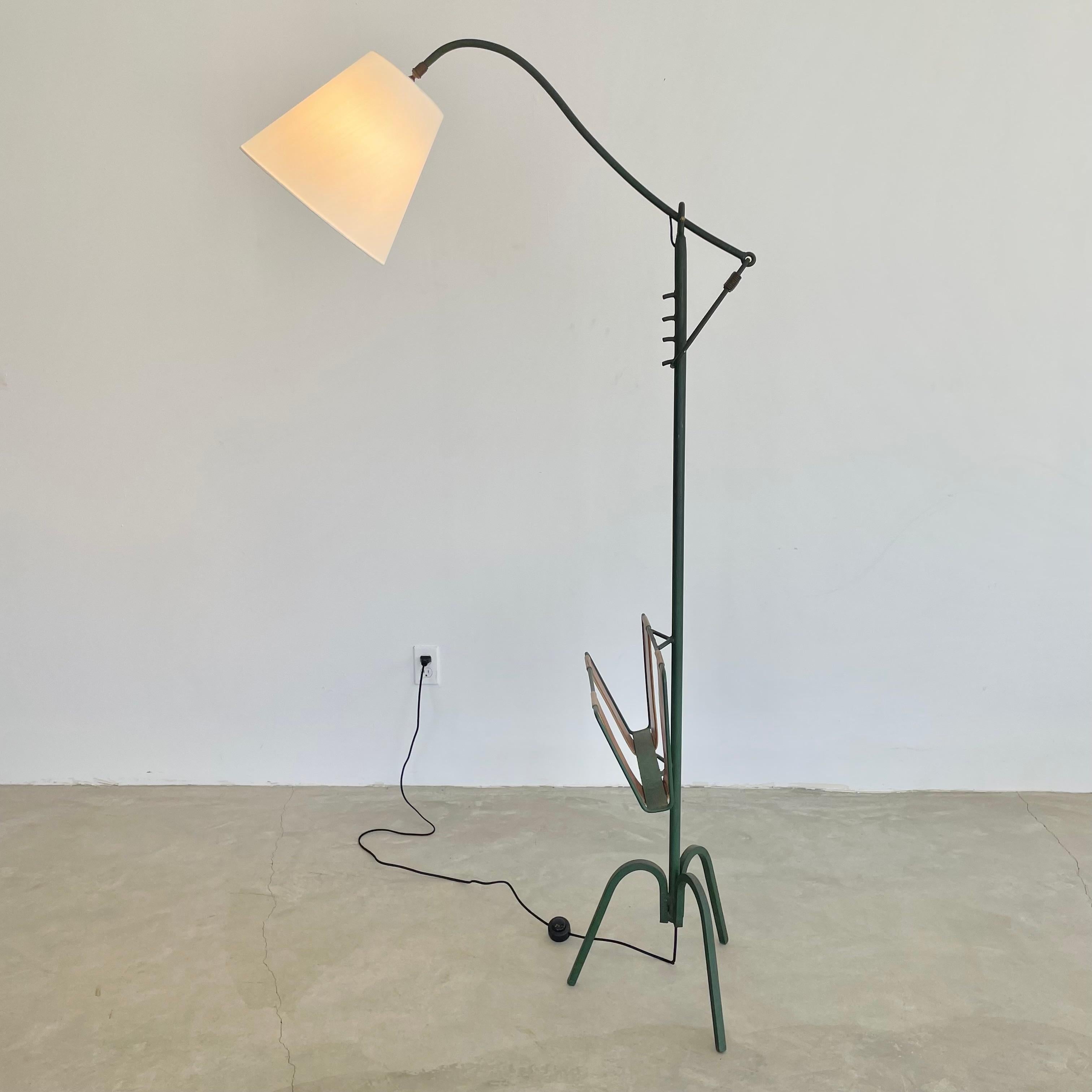 Mid-20th Century Adjustable Iron Floor Lamp in the style of Jacques Adnet, 1950s France For Sale