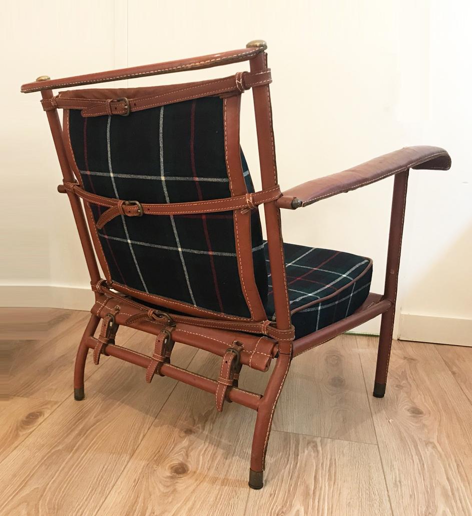  Rare Jacques Adnet hand-stitched leather lounge chair 
 New tartan plaid wool upholstery. 
 Chair shows light scratches and wear, 
 Perfect well lived club chair in an excellent Wabi Sabi condition.
 Pair available
 Located in our store in Miami