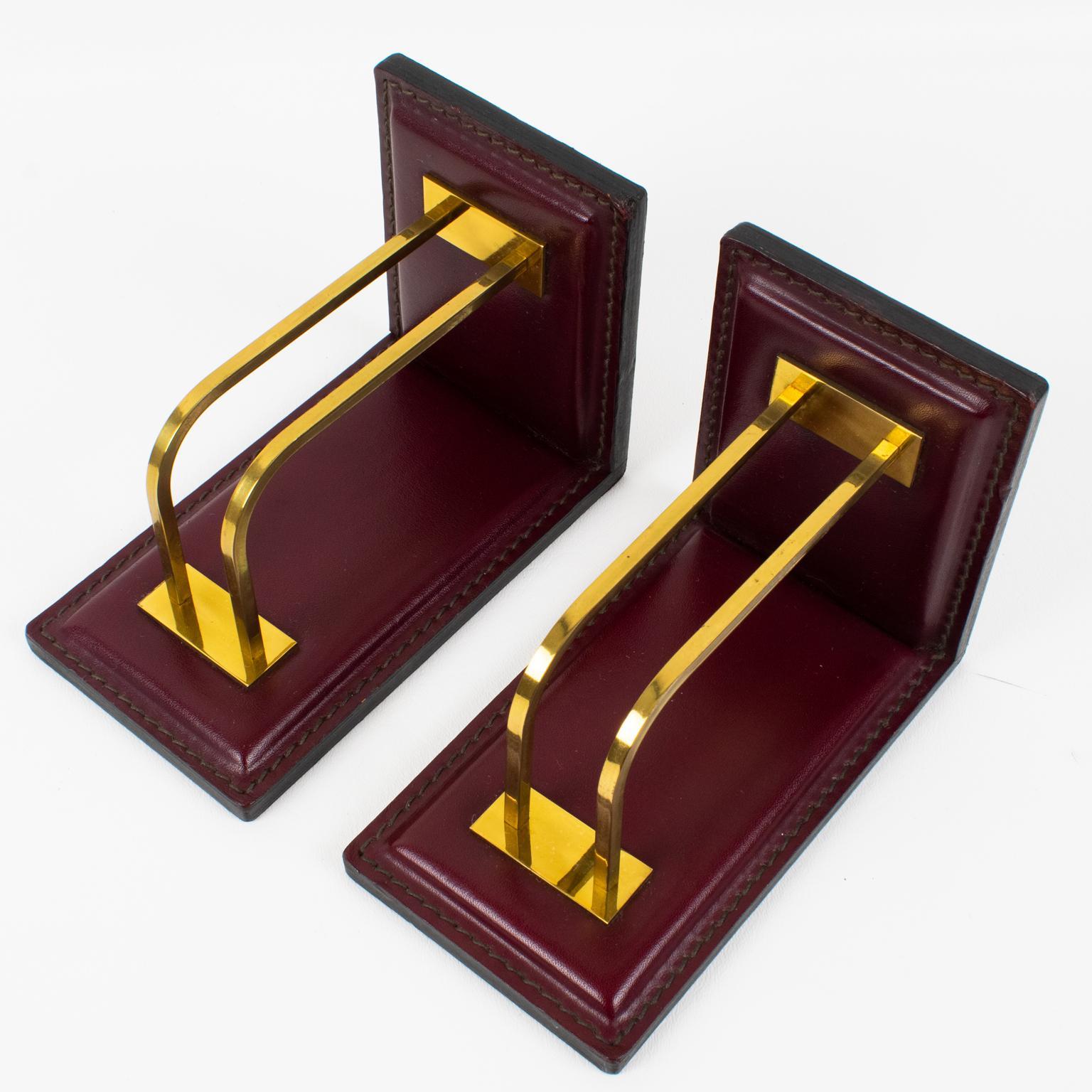 Mid-20th Century Jacques Adnet Hand-Stitched Red Leather and Brass Bookends