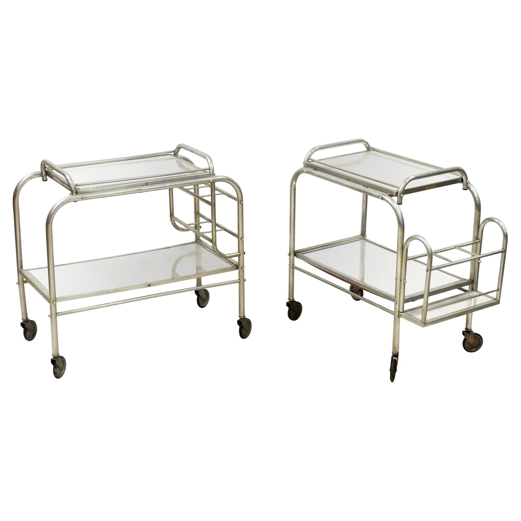 Jacques Adnet ( dans le style de ) avec 2 chariots pouvant faire une paire vers 1930 en vente
