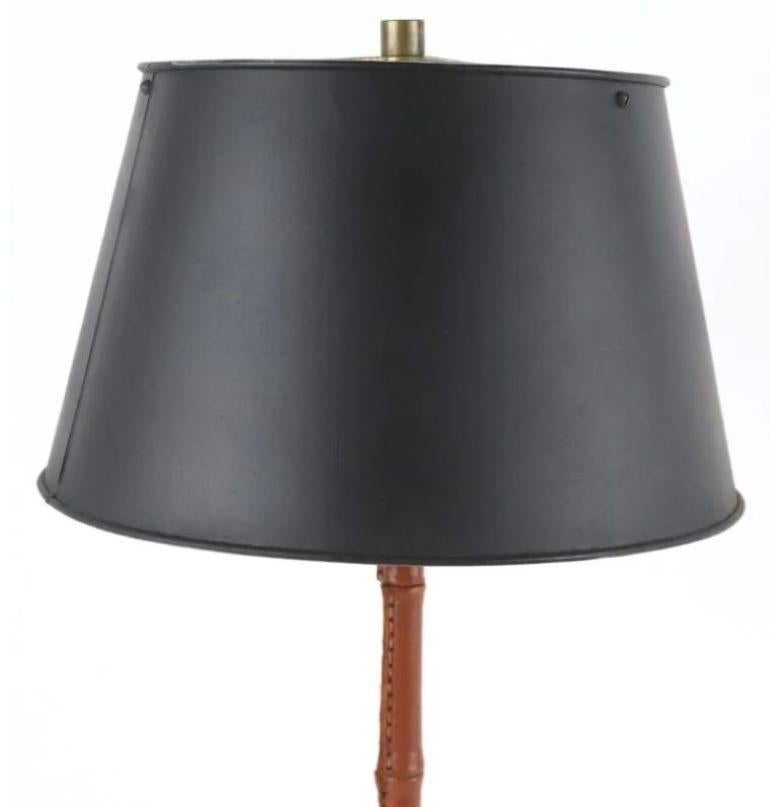 Leather and iron table lamp attributed to Jacques Adnet and Hermes.