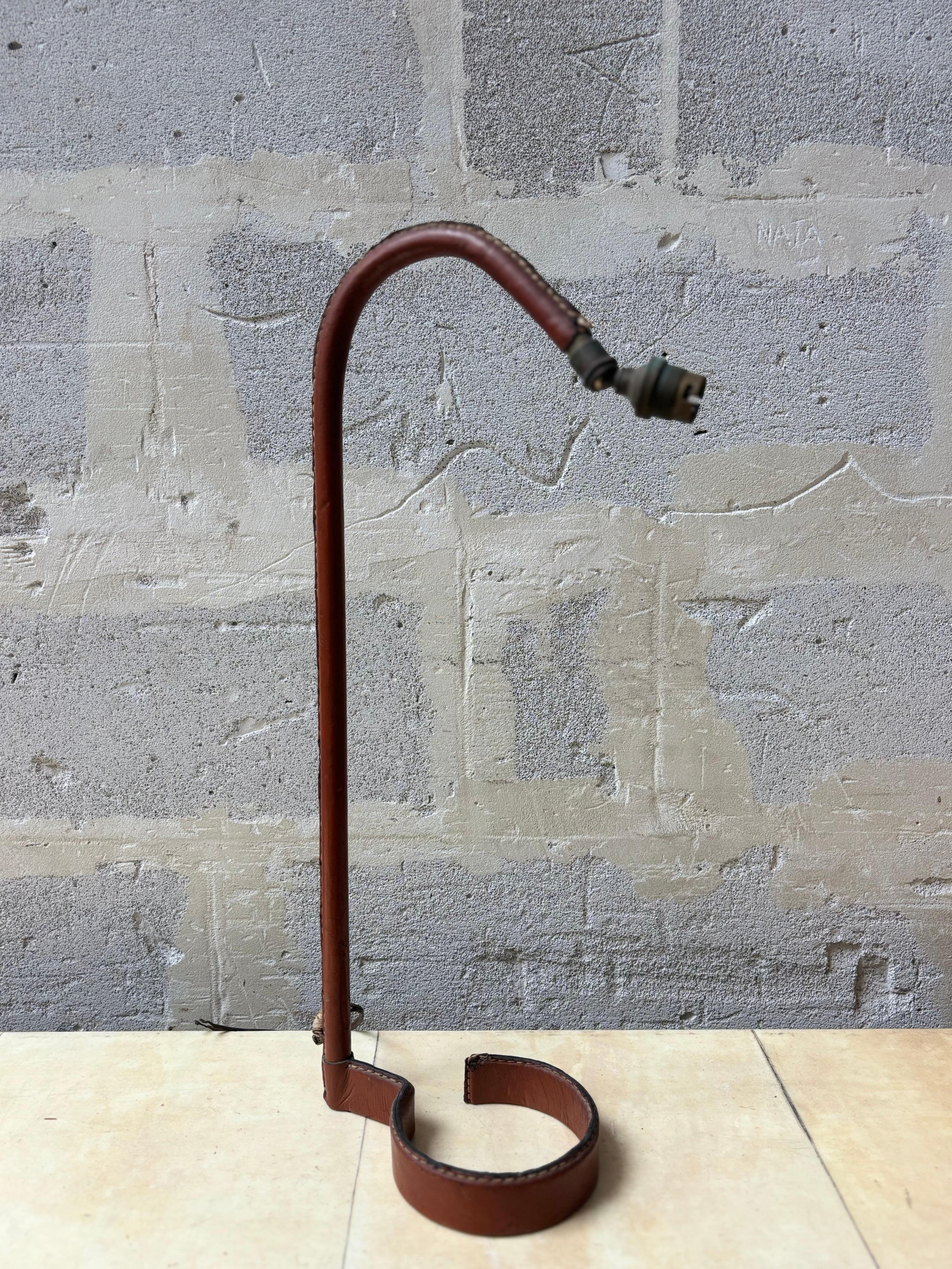 French Jacques Adnet lamp in brown leather For Sale