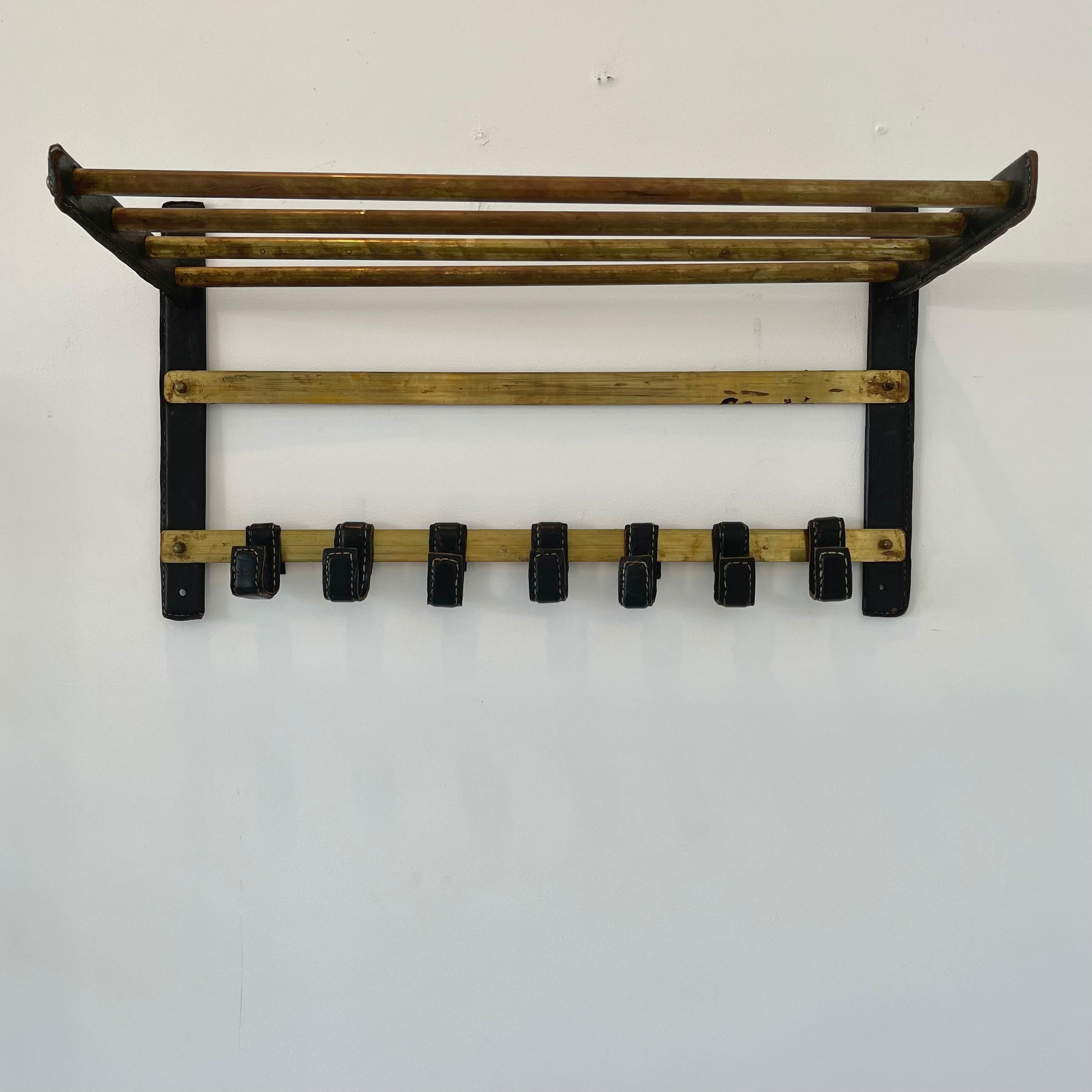 French Jacques Adnet Leather and Brass Wall Rack, 1950s France For Sale