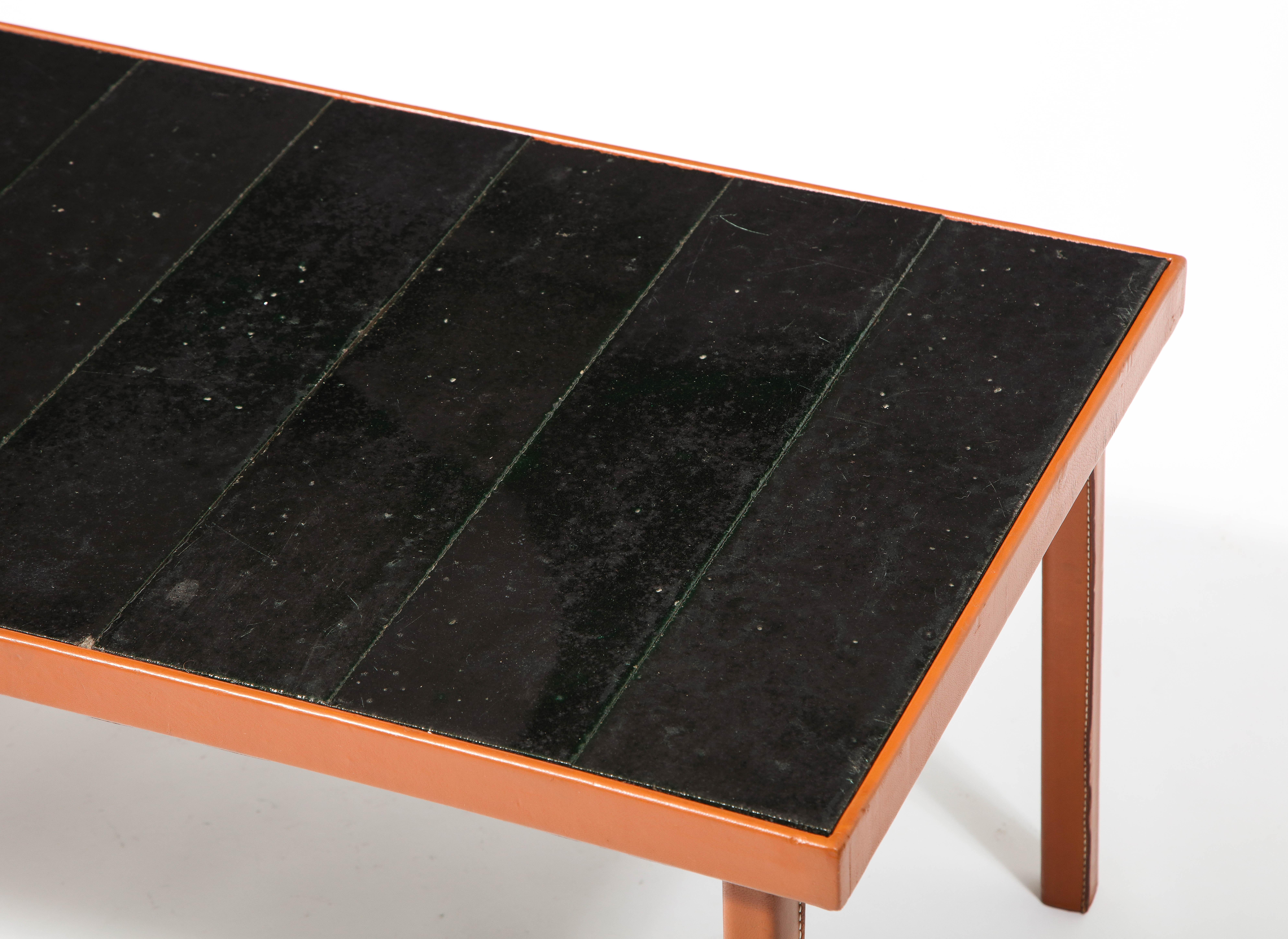 20ième siècle Table en cuir et carreaux de pierre de lave de style Jouve foncé, France, années 1950 en vente