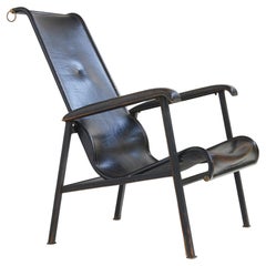 Sedia con schienale alto in pelle Jacques Adnet Ed.Compagnie des Arts, Francia c.C. 1950