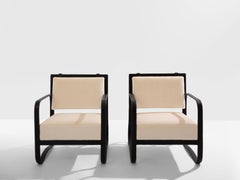 Jacques Adnet Sesselpaar aus Leder und Mohair-Samt 1950