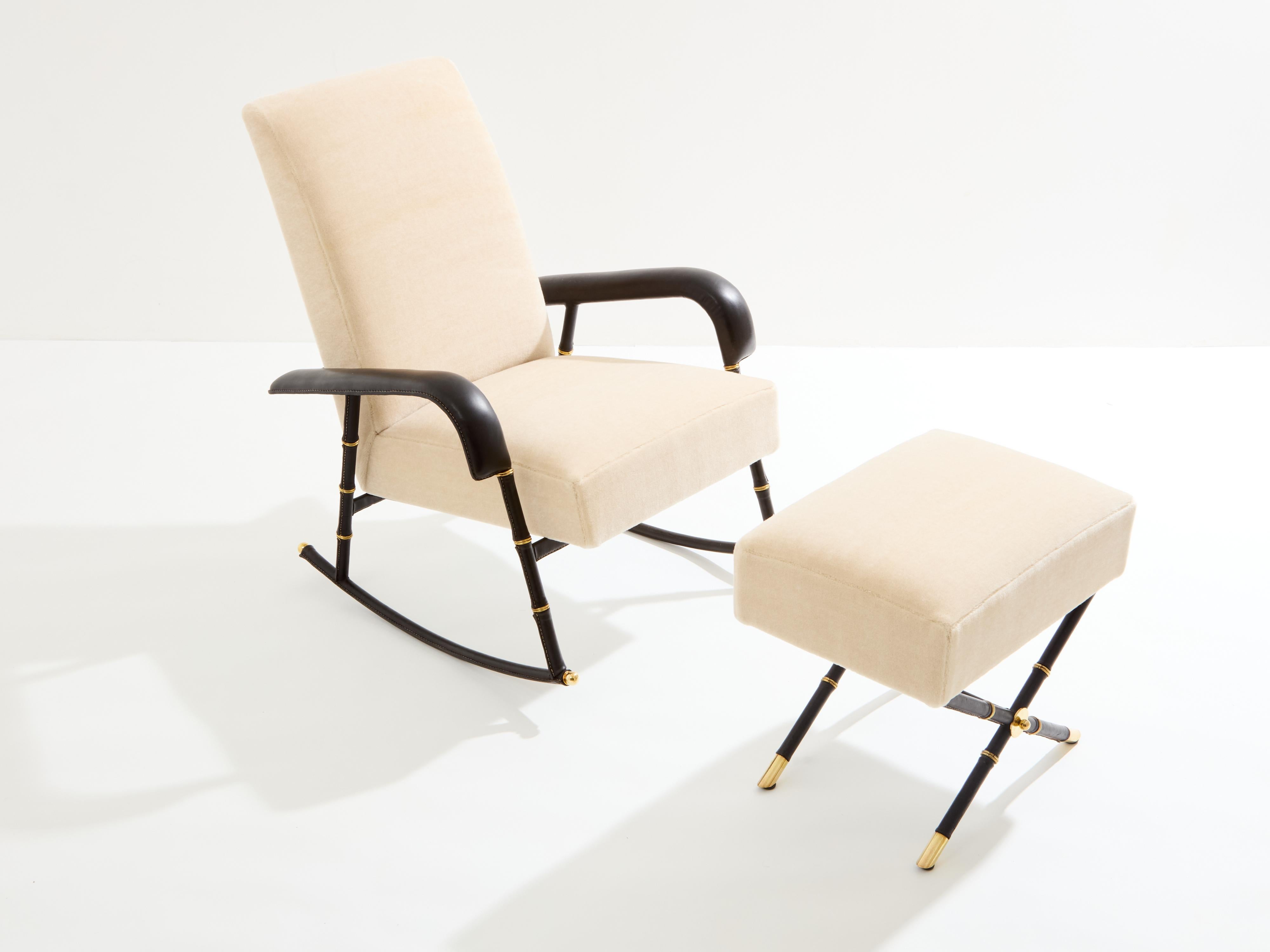 Superb rocking chair and ottoman in leather and mohair velvet by Jacques Adnet dating from the early 1950s. This set is characteristic of Adnet's work, soft saddle-stitched leather dit piqué sellier, and visible brass details and screws. The line is