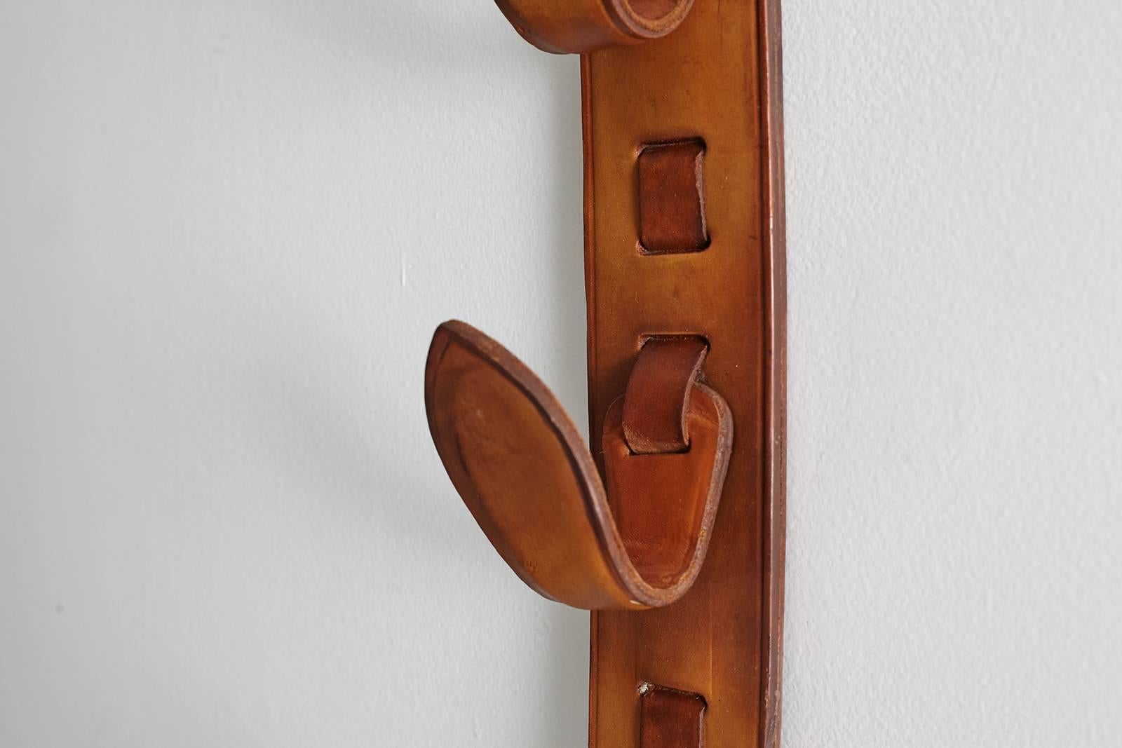 Mid-20th Century Jacques Adnet Leather Set of Three Wall Hooks