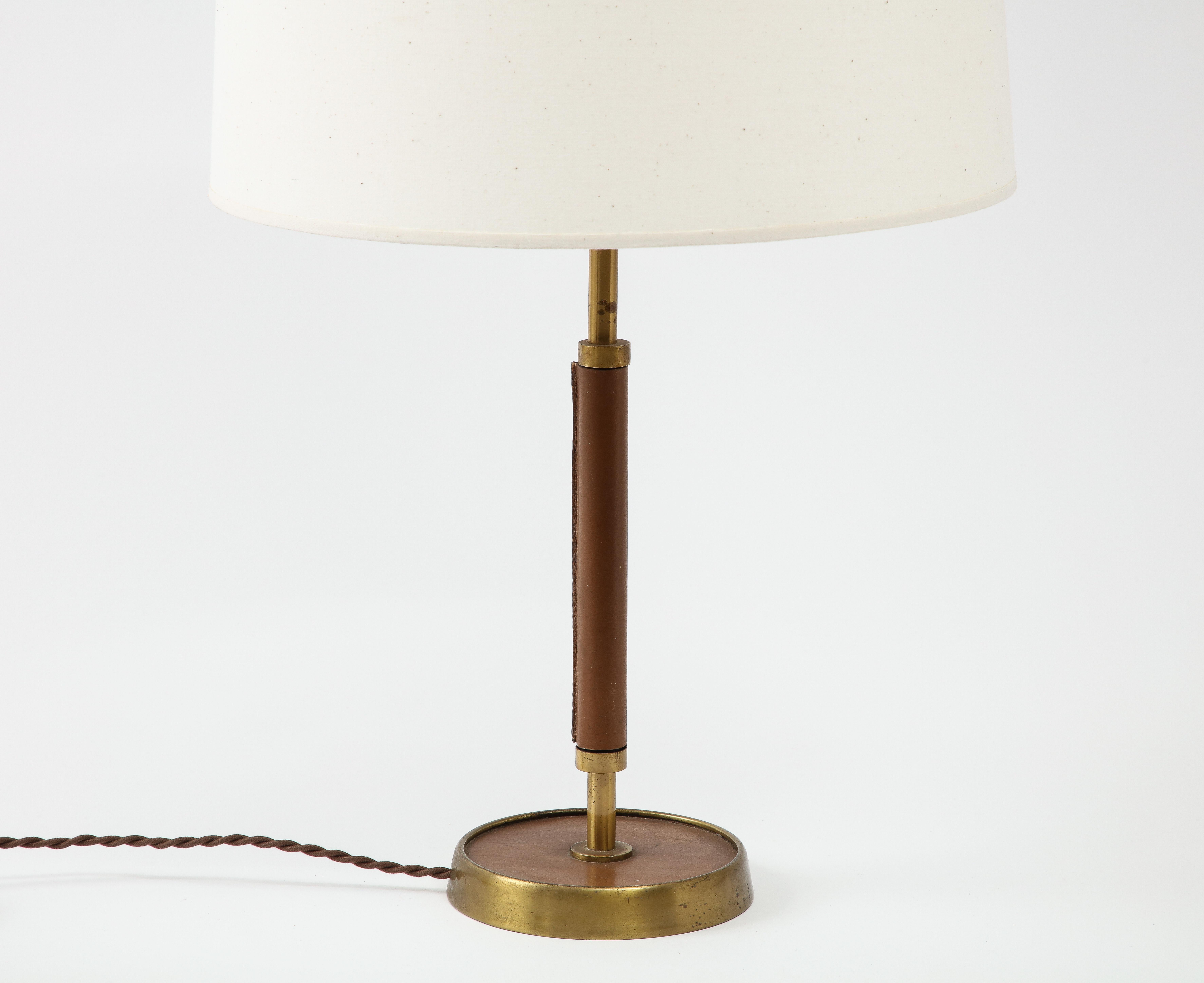 French Jacques Adnet Style Leather Stitched and Brass Table Lamp, France 1960's