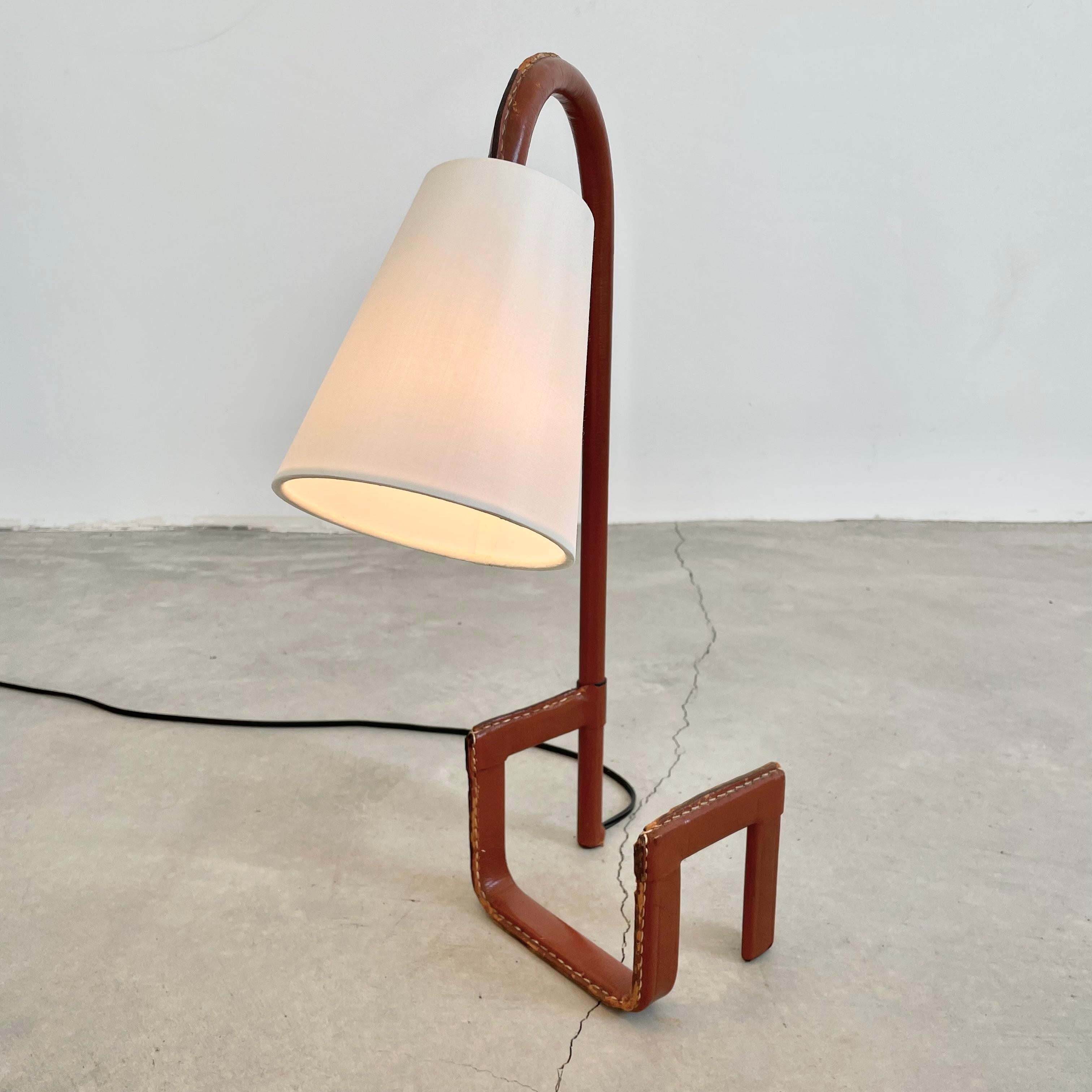 Mid-20th Century Jacques Adnet Leather Table Lamp with Built-In Bookshelf, 1950s France For Sale