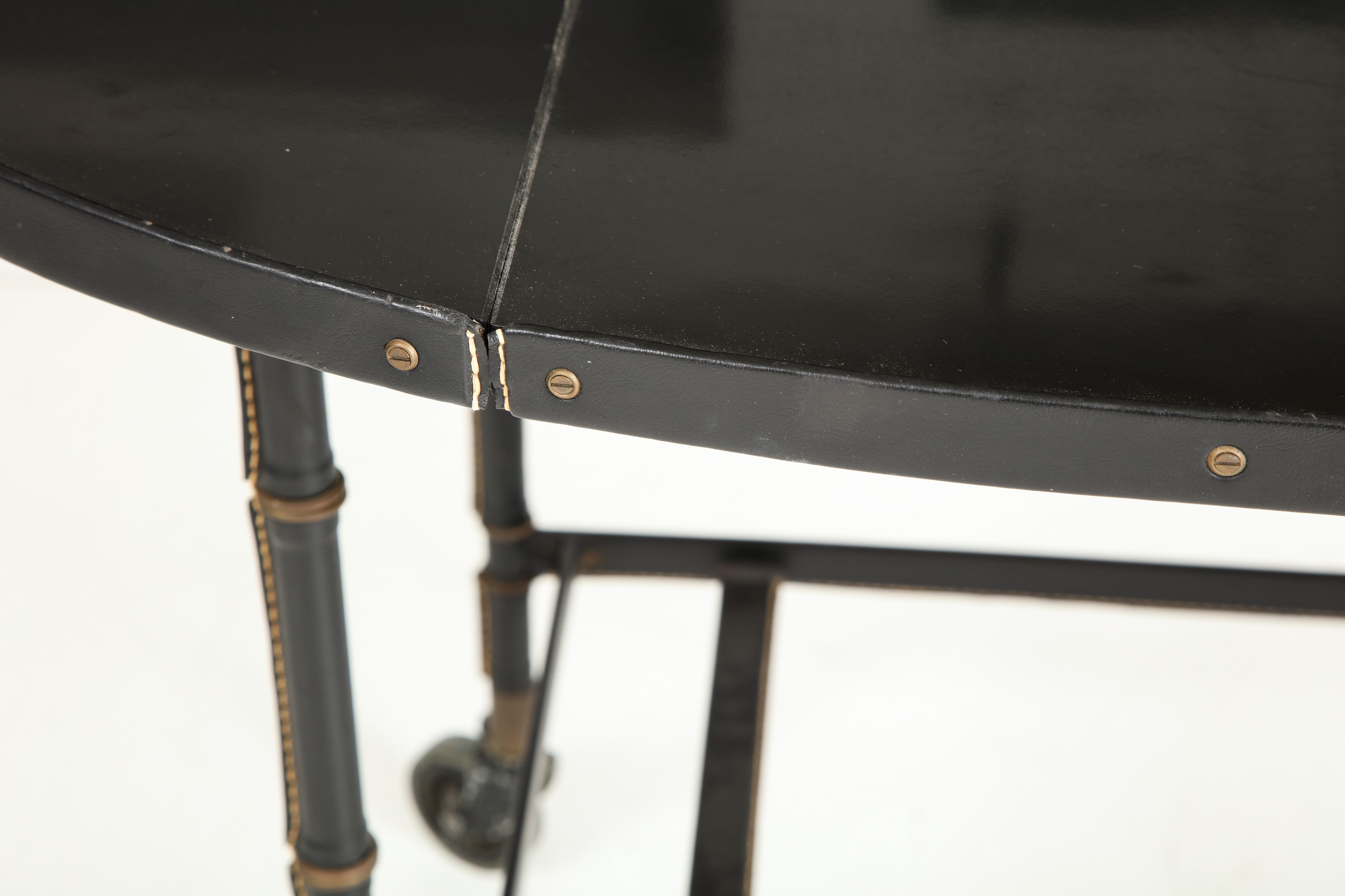 Lacquered Jacques Adnet Leather Wrapped Drop-Leaf Serving Table on Casters, France, 1950s