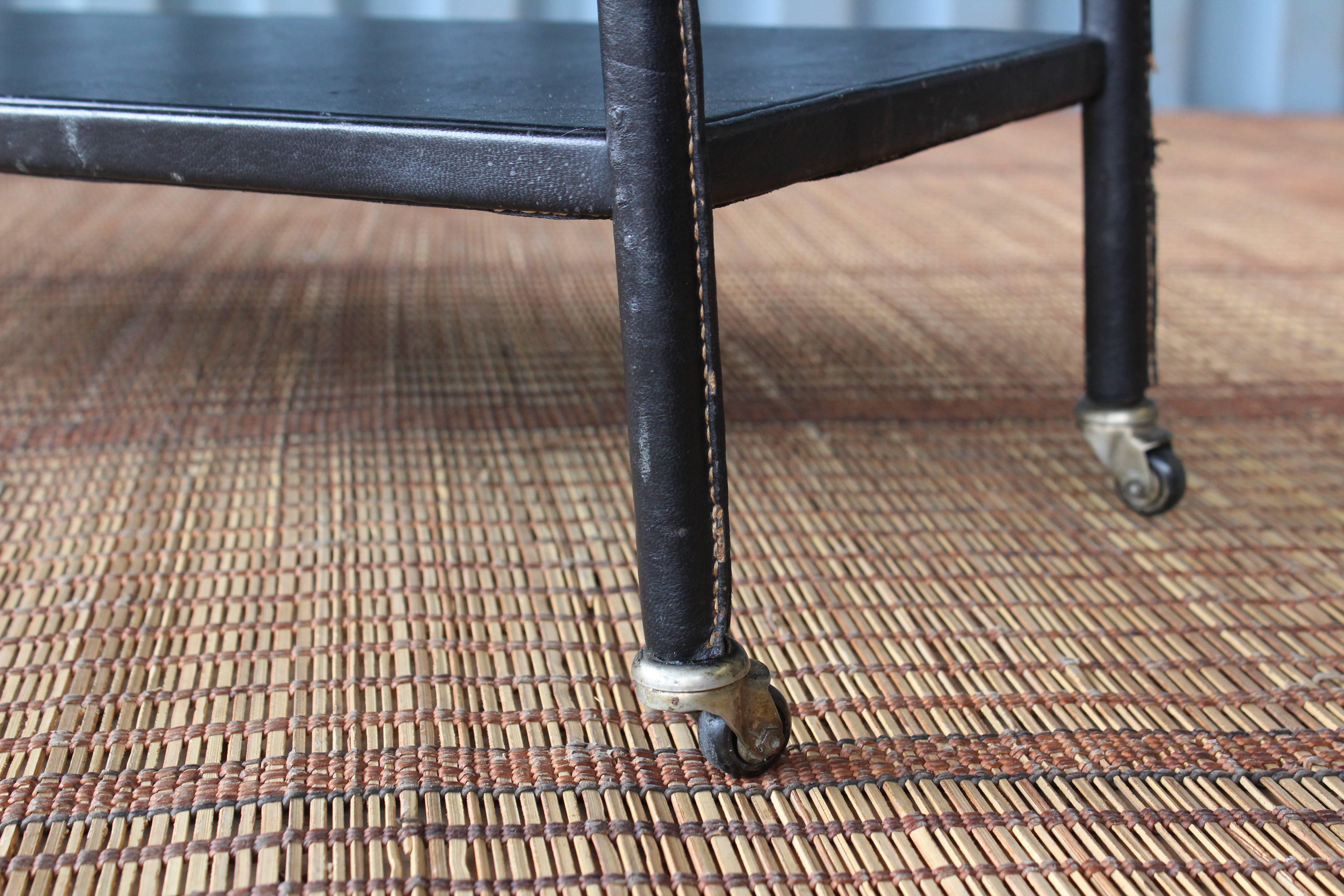 Jacques Adnet Leather Wrapped Shelf on Casters In Good Condition In Los Angeles, CA