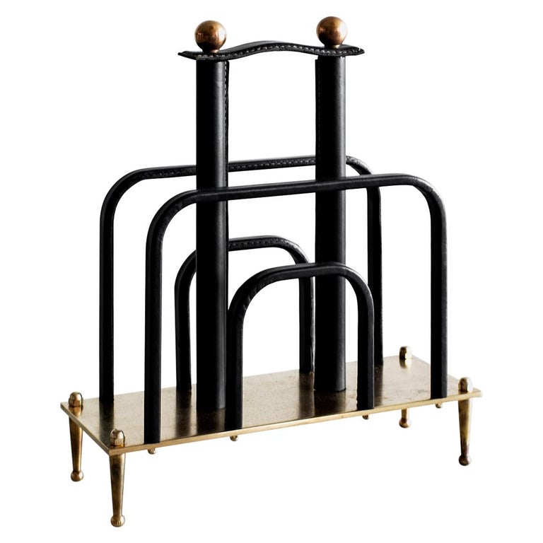 Jacques Adnet magazine rack, 1940s, offered by Orange Furniture