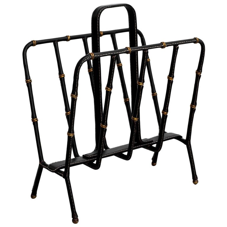 Jacques Adnet magazine rack, 1940s, offered by Orange Furniture