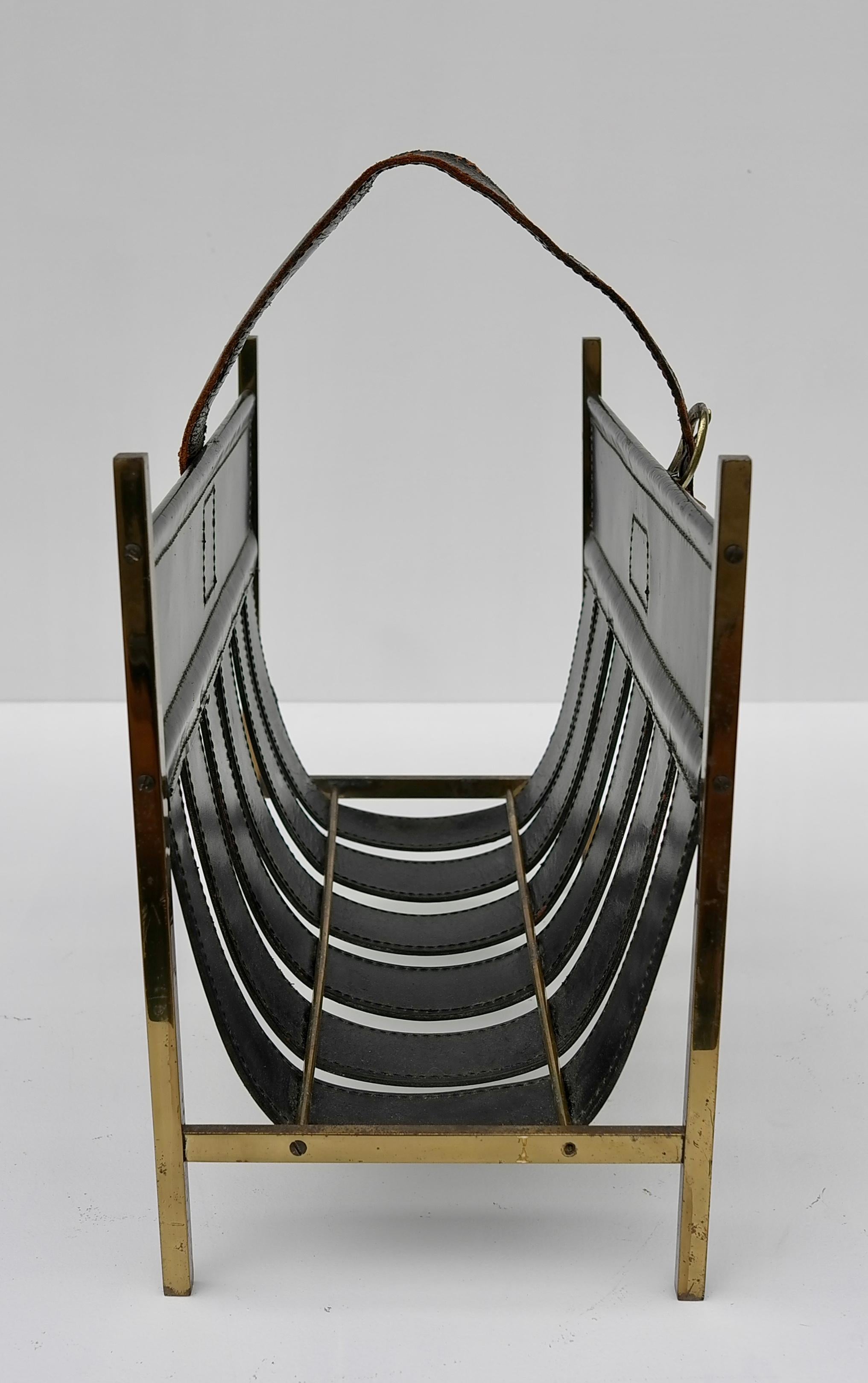 Mid-20th Century Jacques Adnet Magazine Rack in Black Sling Leather and Brass, France 1960's