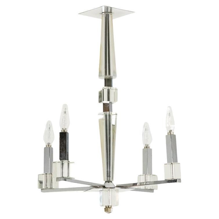 Jacques Adnet. Modernist chandelier in chrome metal. Circa 1940.