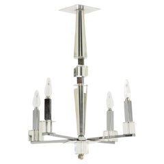 Jacques Adnet. Modernist chandelier in chrome metal. Circa 1940.