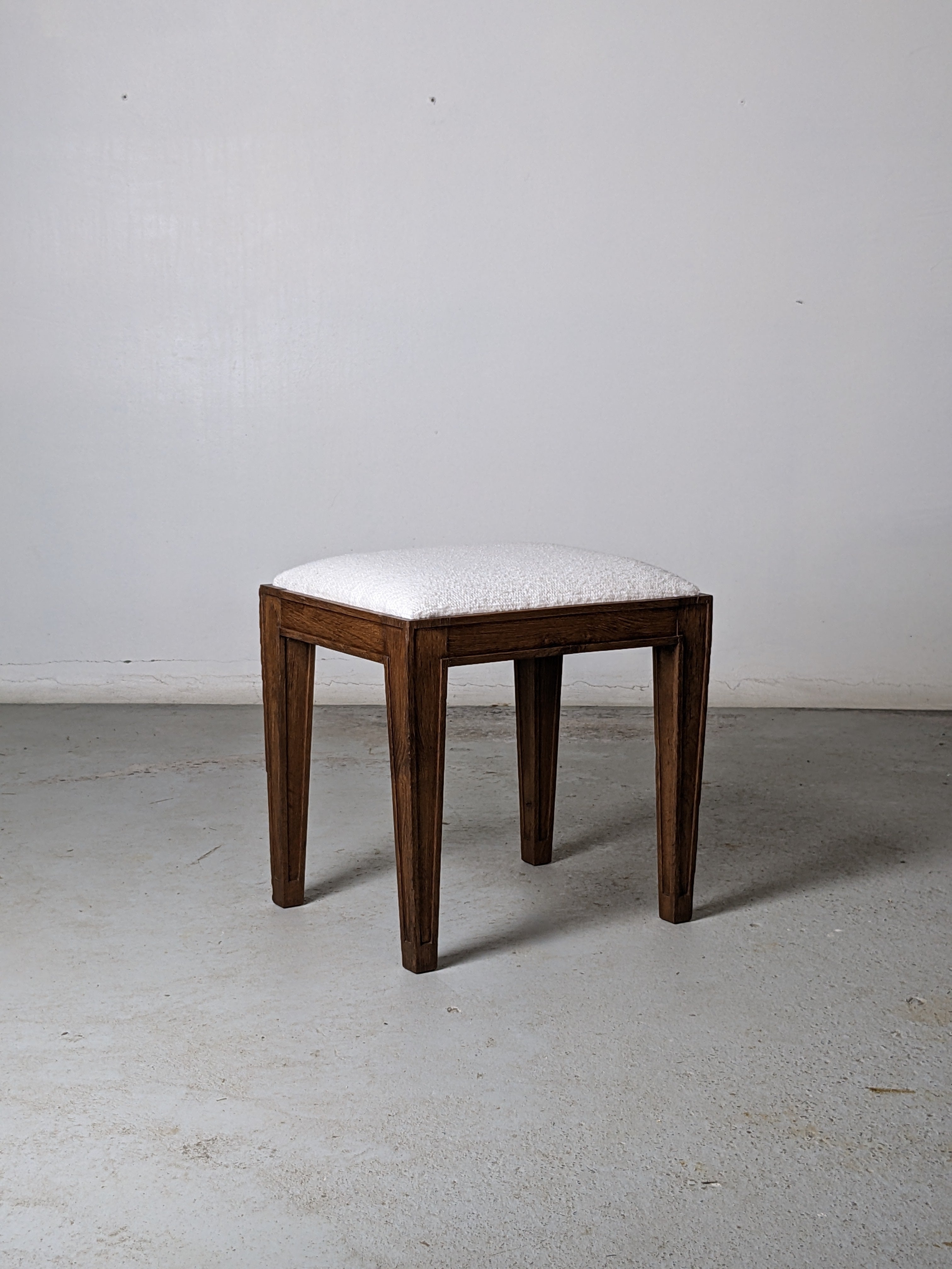 Small stool by french designer Jacques Adnet.
Solid oak wood and upholstery.
Made in France in the 1940s.

Newly reupholstered with Pierre Frey fabric.