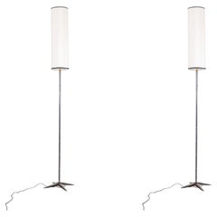 Jacques Adnet. Pair of bronze floor lamps. 1950s.