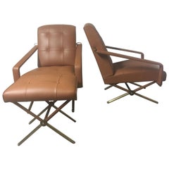 Jacques Adnet Pair of Brown Leather Armchairs and One Ottoman, French, 1950 Jacques Adnet Pair of Brown Leather Armchairs and One Ottoman, French, 1950
