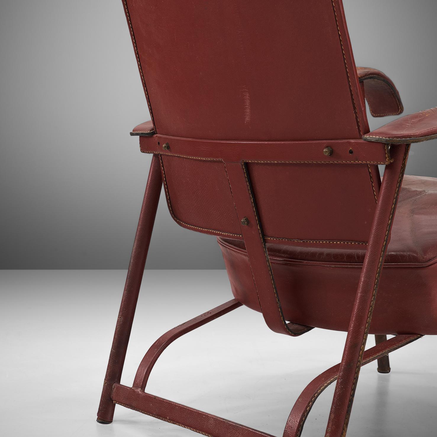 French Jacques Adnet Pair of Lounge Chairs in Patinated Burgundy Leather