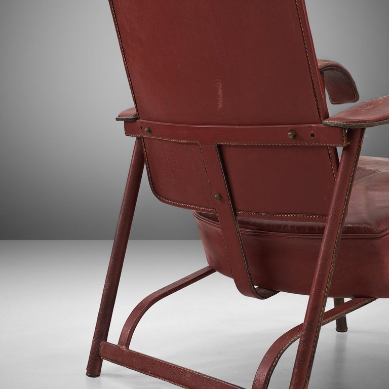 French Jacques Adnet Pair of Lounge Chairs in Patinated Burgundy Leather For Sale