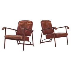 Jacques Adnet Pair of Lounge Chairs in Patinated Burgundy Leather