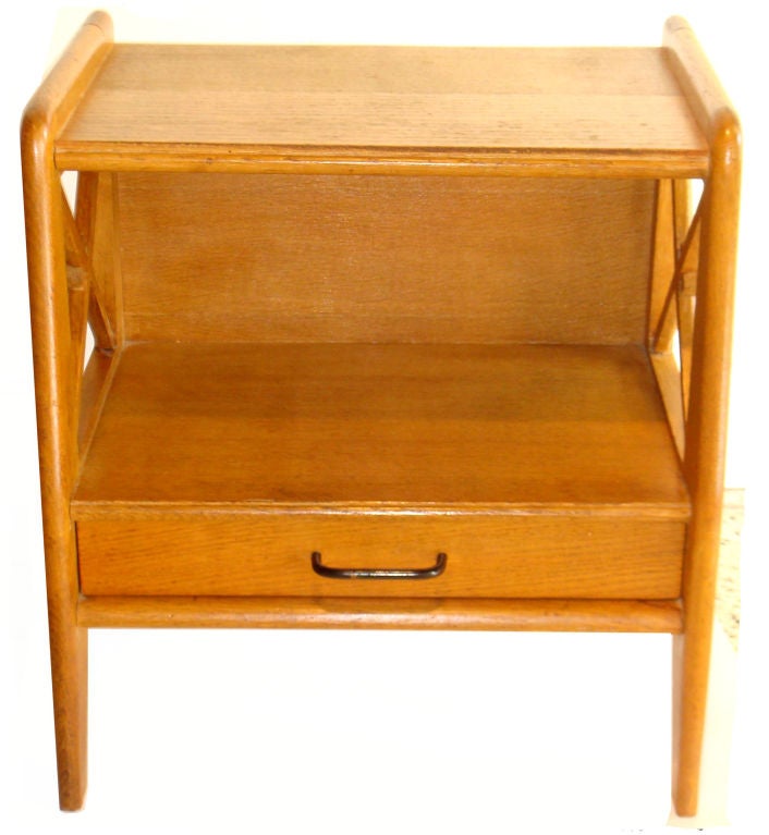 Pair of oak side tables or nightstands designed by Jacques Adnet with one front drawer.