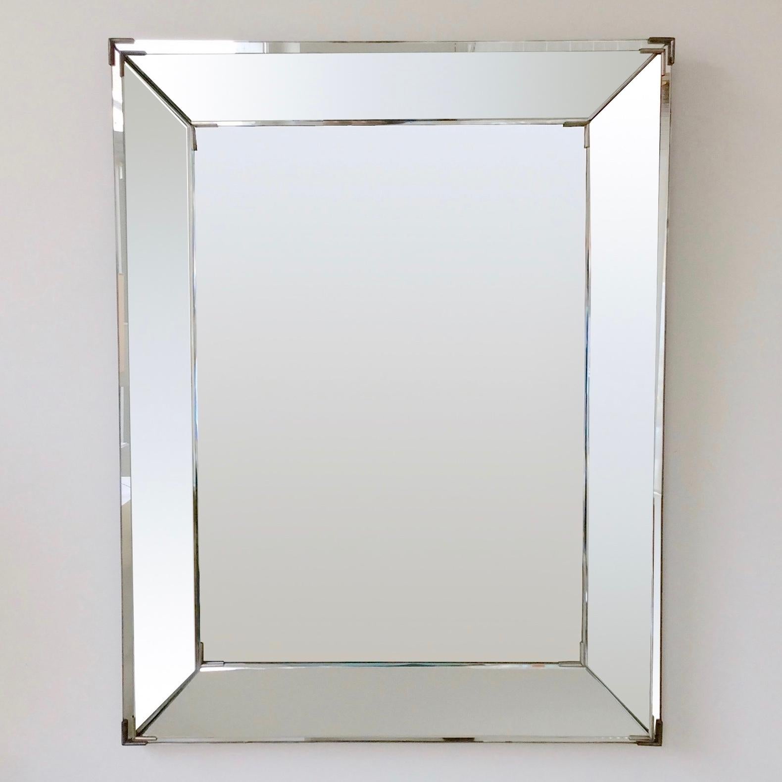 Nice large Jacques Adnet wall mirror, circa 1940, France.
Parcloses mirror, nickeled metal, wood.
Dimensions: 91 cm H, 71 cm W, 7 cm D.
Good original condition.
All purchases are covered by our Buyer Protection Guarantee.
This item can be