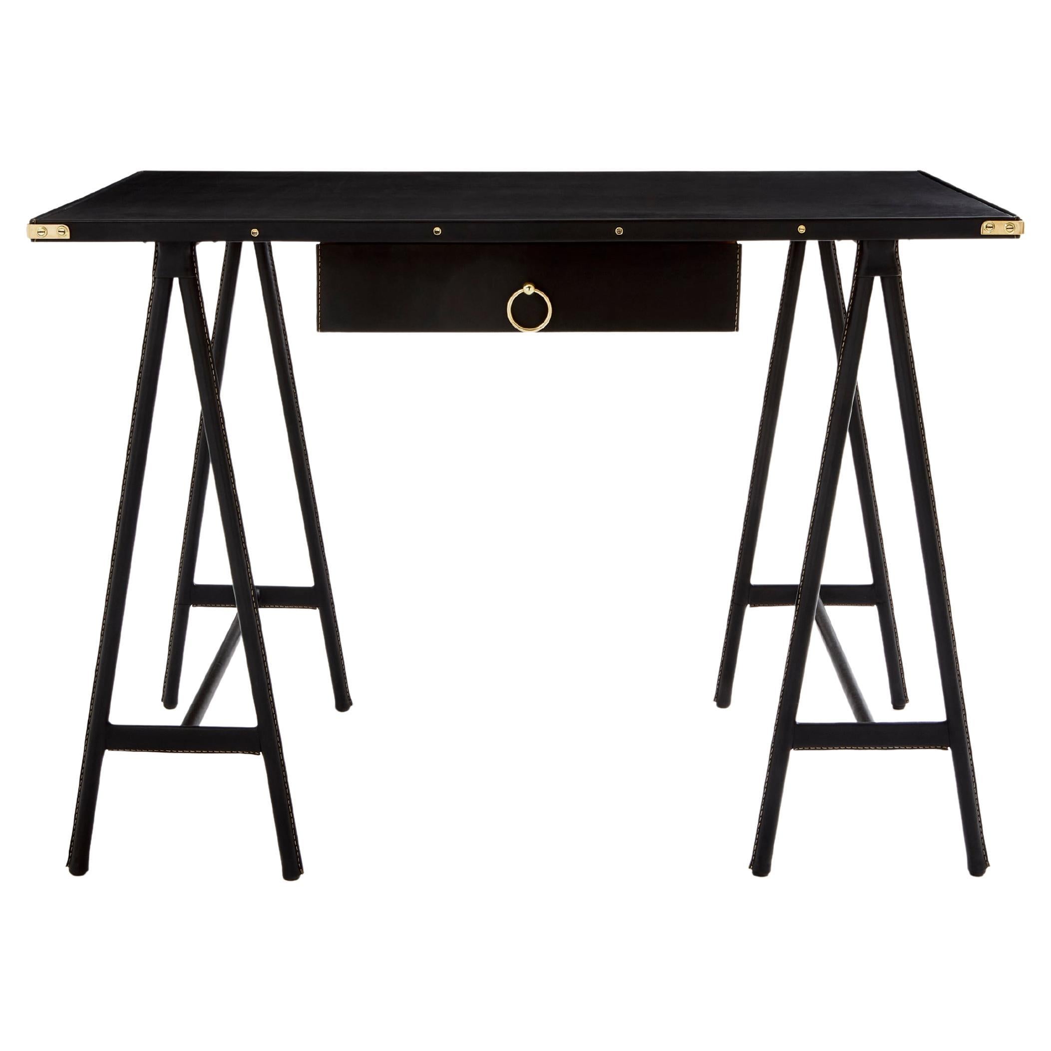 Bureau en cuir piqué sellier et laiton Jacques Adnet 1950