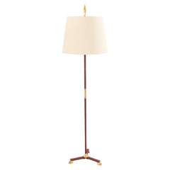 Jacques Adnet pique sellier cuero rojo latón lámpara de pie 1950