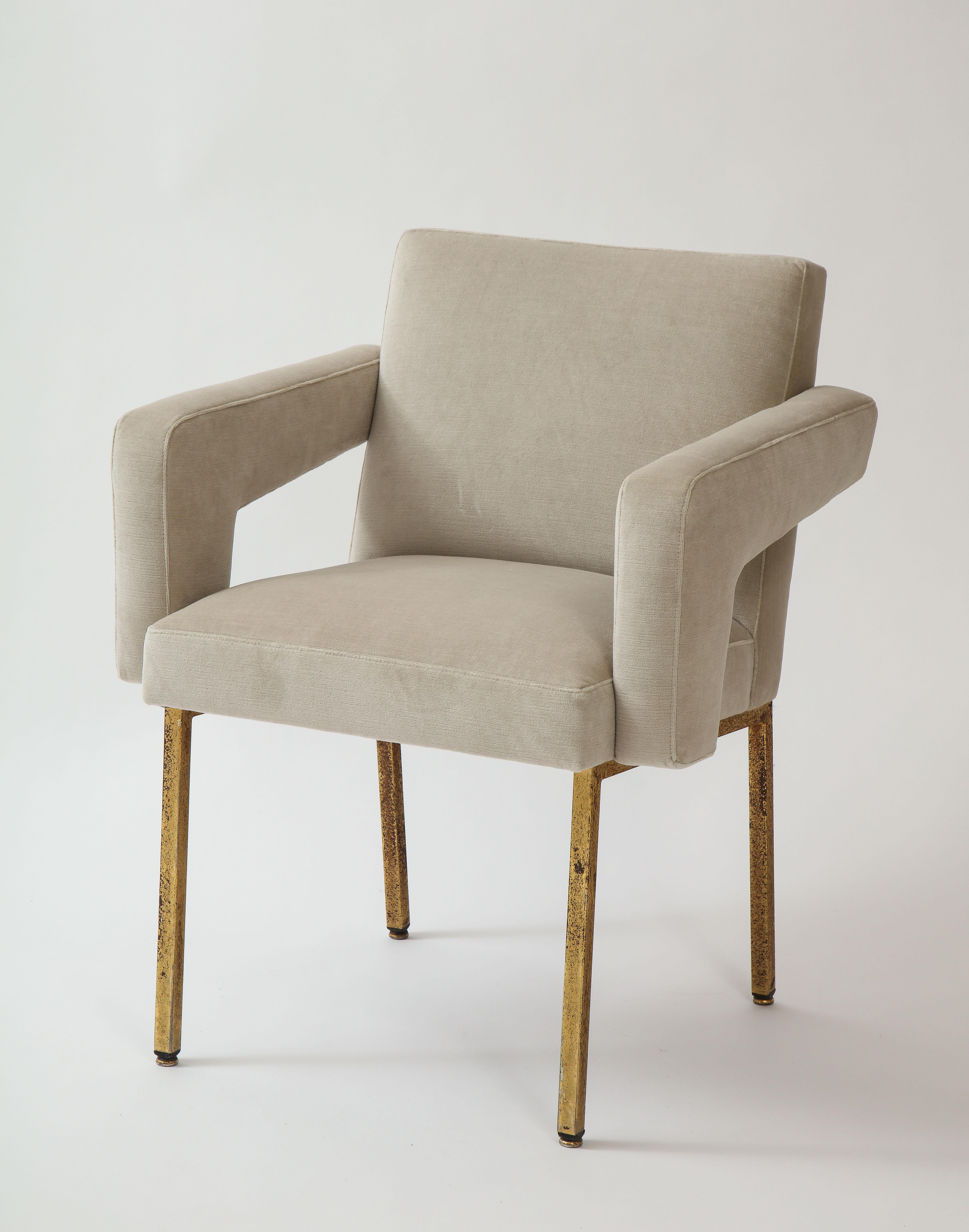 Jacques Adnet president chair brass, re-upholstered grey velvet, France, 1959

Beautiful and chic office or desk chair. Reupholstered in a light grey velvet. Incredible modern design.