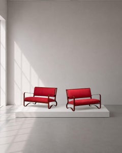 Jacques Adnet, rari divani a due posti, pelle, acciaio, Francia, anni '50
